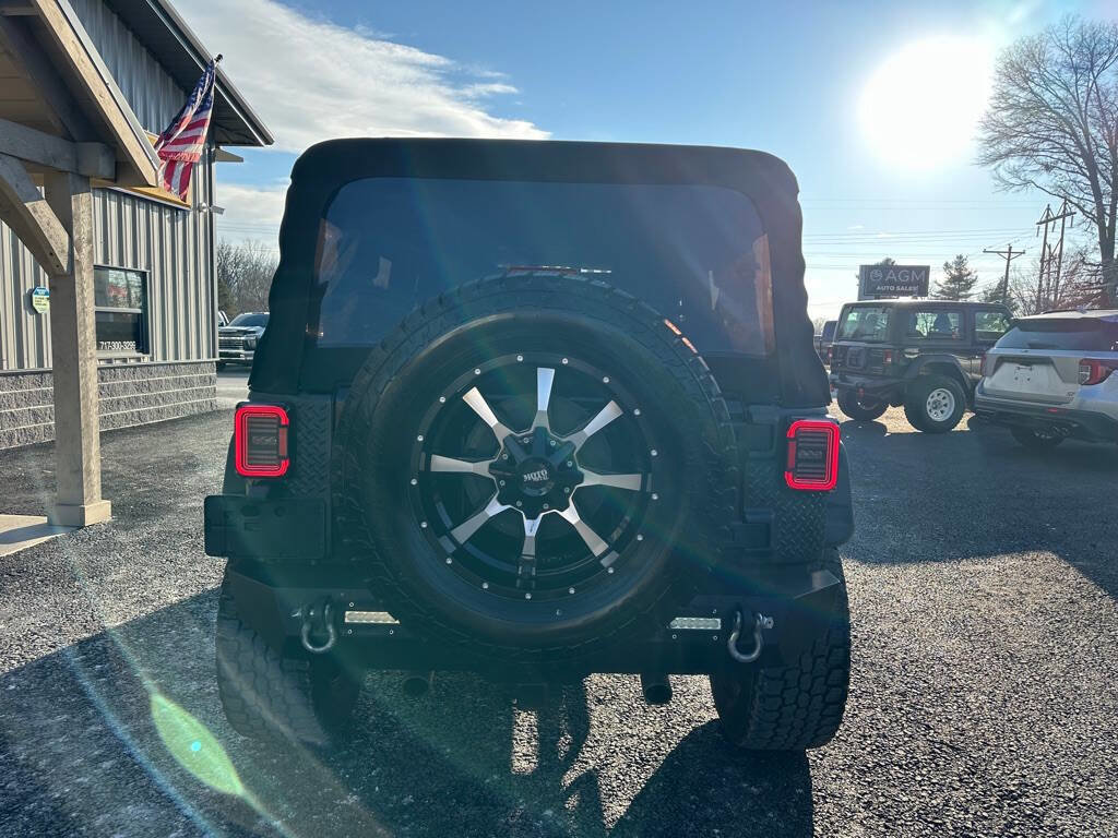 Used 2012 Jeep Wrangler Unlimited Rubicon w/ Dual Top Group image 6