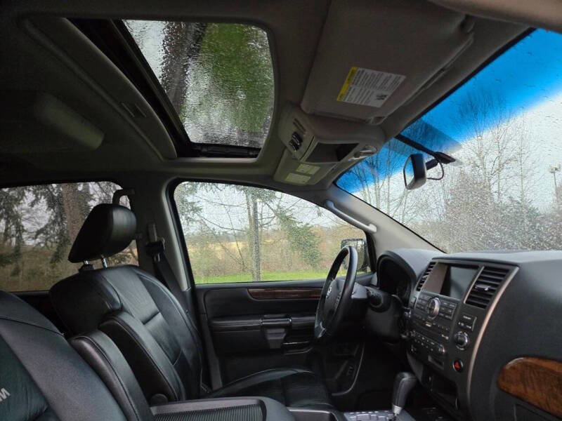 Used 2010 Nissan Armada Platinum image 1