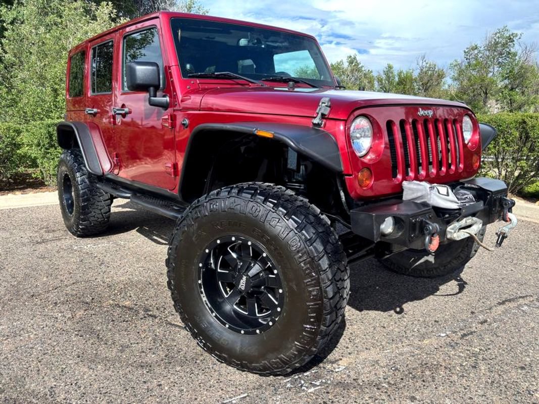 Used 2013 Jeep Wrangler Unlimited Sahara w/ Dual Top Group AWD/4WD image 2