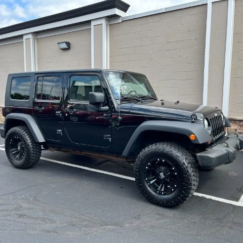 Used 2010 Jeep Wrangler Unlimited Sport image 1