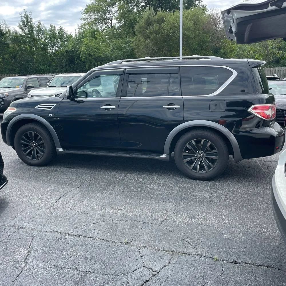 Used 2017 Nissan Armada Platinum w/ Captain Seat Package AWD/4WD image 3