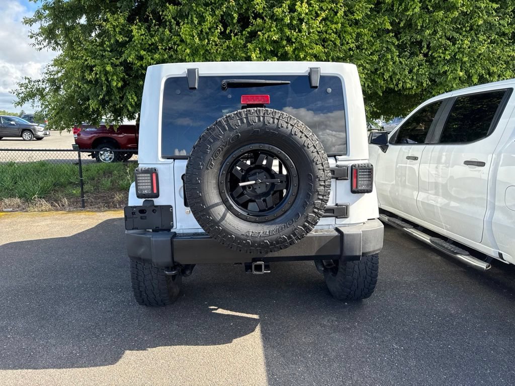 Used 2014 Jeep Wrangler Unlimited Sahara w/ Dual Top Group AWD/4WD image 4
