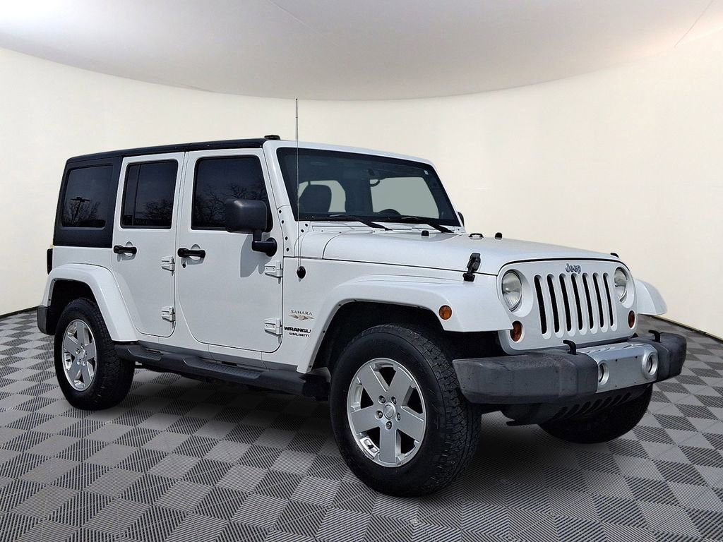 Used 2012 Jeep Wrangler Unlimited Sahara w/ Dual Top Group image 1
