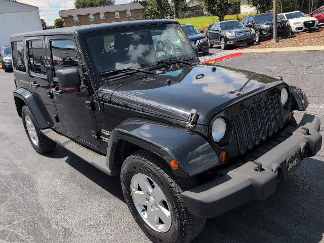 Used 2012 Jeep Wrangler Unlimited Sahara w/ Dual Top Group image 2