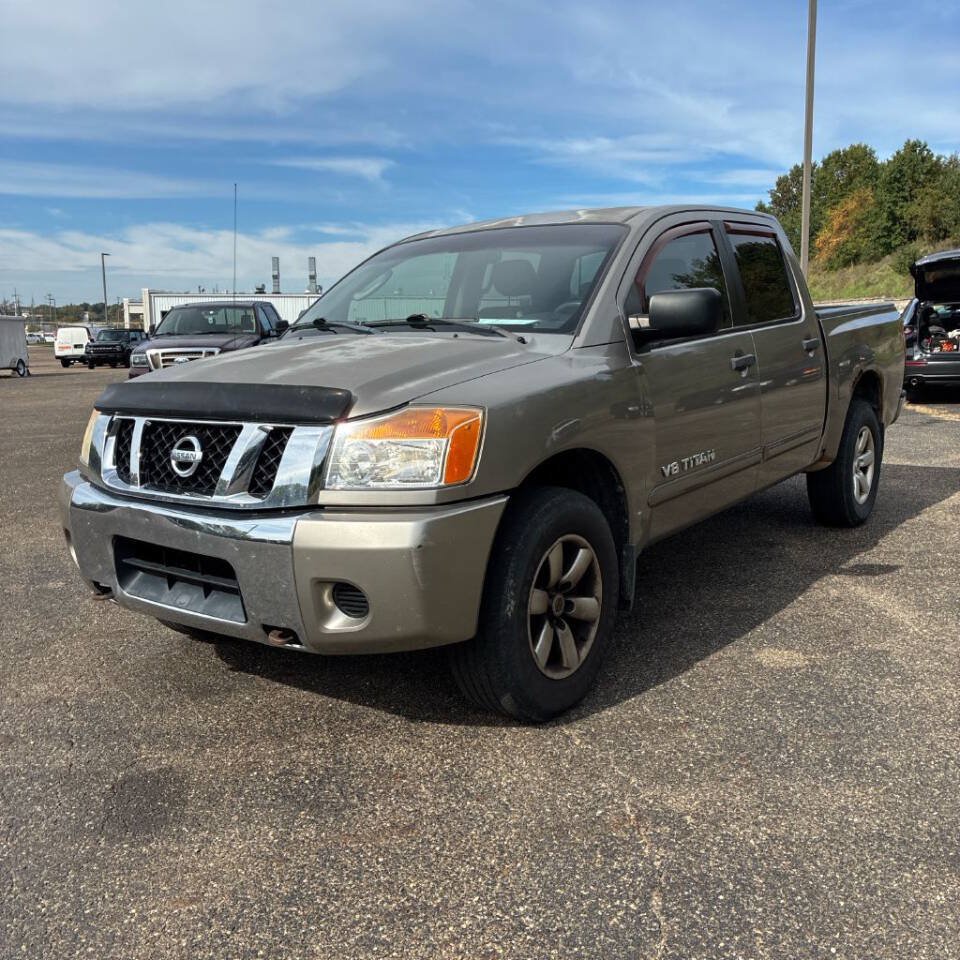 Used 2009 Nissan Titan SE AWD/4WD image 1