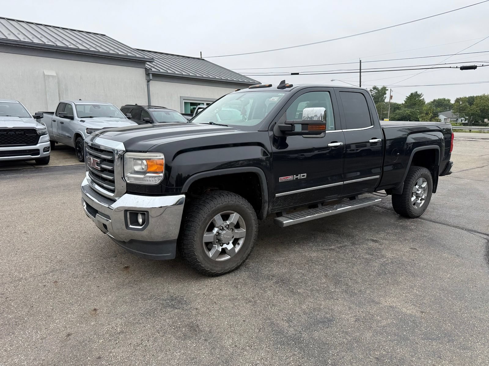 Used 2015 GMC Sierra 2500 SLE w/ All-Terrain HD Package AWD/4WD image 1