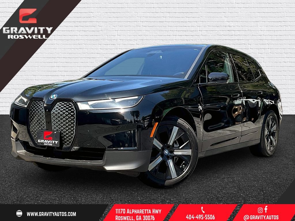 Used 2024 BMW iX xDrive50 w/ Premium Package AWD/4WD image 1