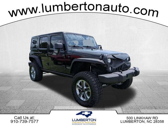 Used 2015 Jeep Wrangler Unlimited Rubicon w/ Dual Top Group AWD/4WD image 1