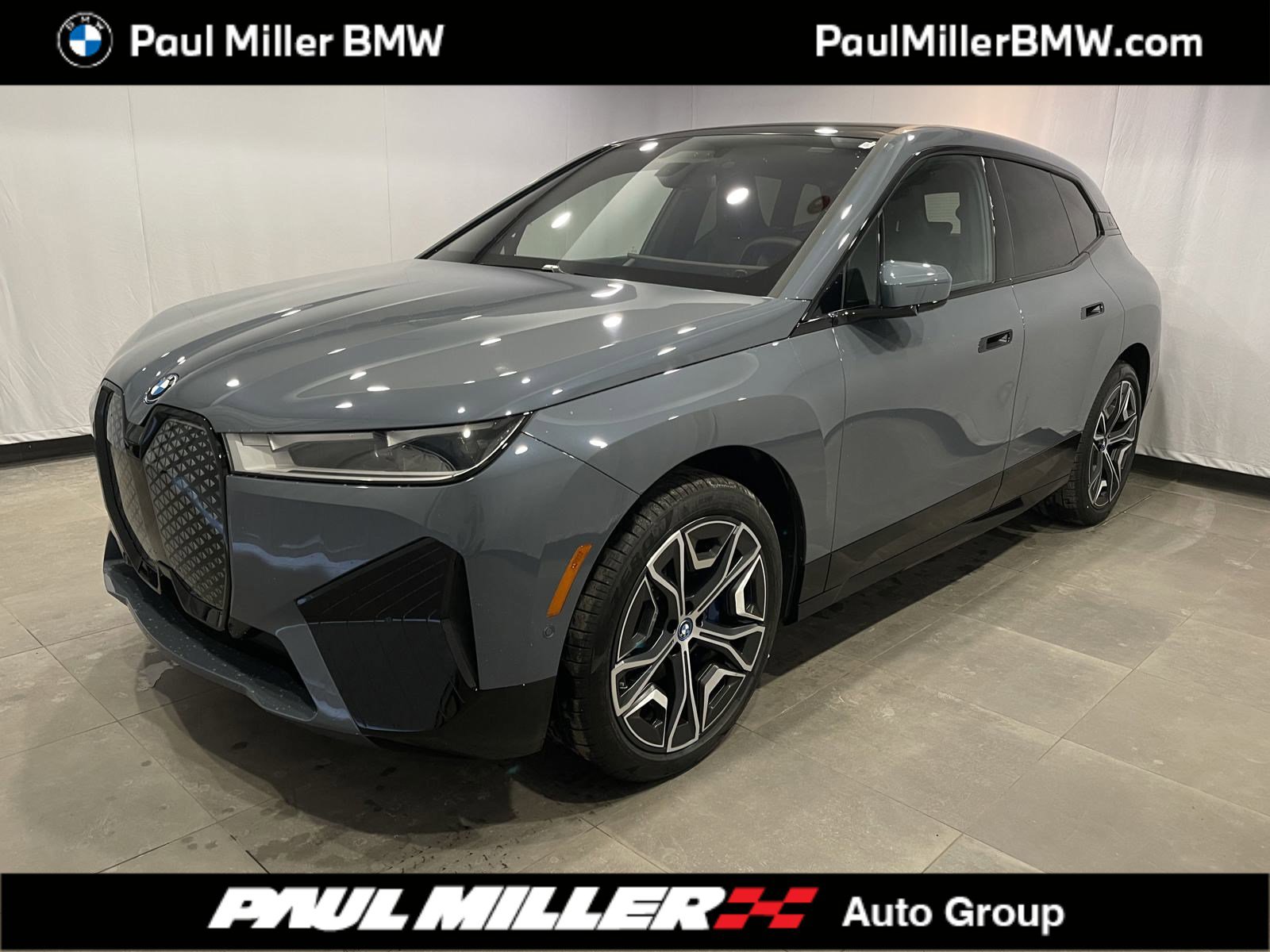 Certified 2025 BMW iX xDrive50 w/ Premium Package image 1