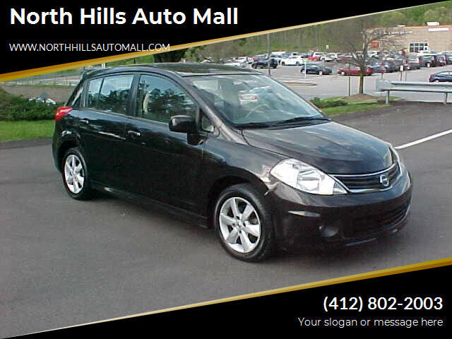 Used 2011 Nissan Versa SL w/ Premium Pkg image 1