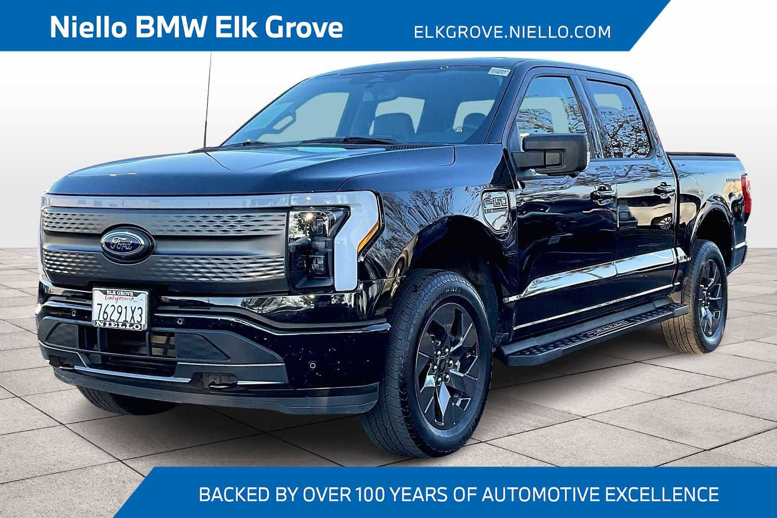 Used 2023 Ford F150 Lightning XLT w/ Equipment Group 312A High image 1