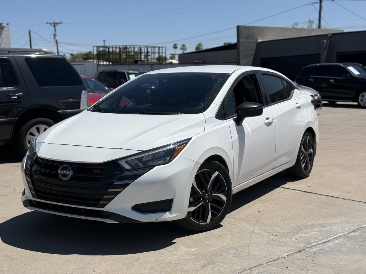 Used 2023 Nissan Versa SR w/ Trunk Package FWD image 1