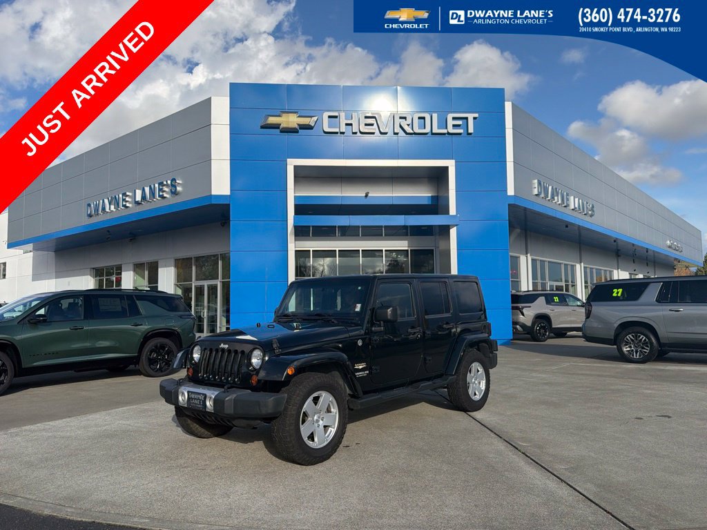 Used 2012 Jeep Wrangler Unlimited Sahara AWD/4WD image 1