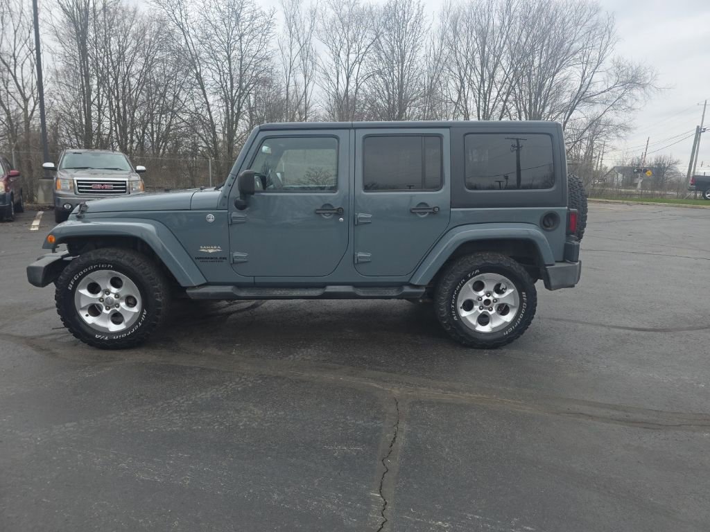 Used 2015 Jeep Wrangler Unlimited Sahara w/ Dual Top Group image 4