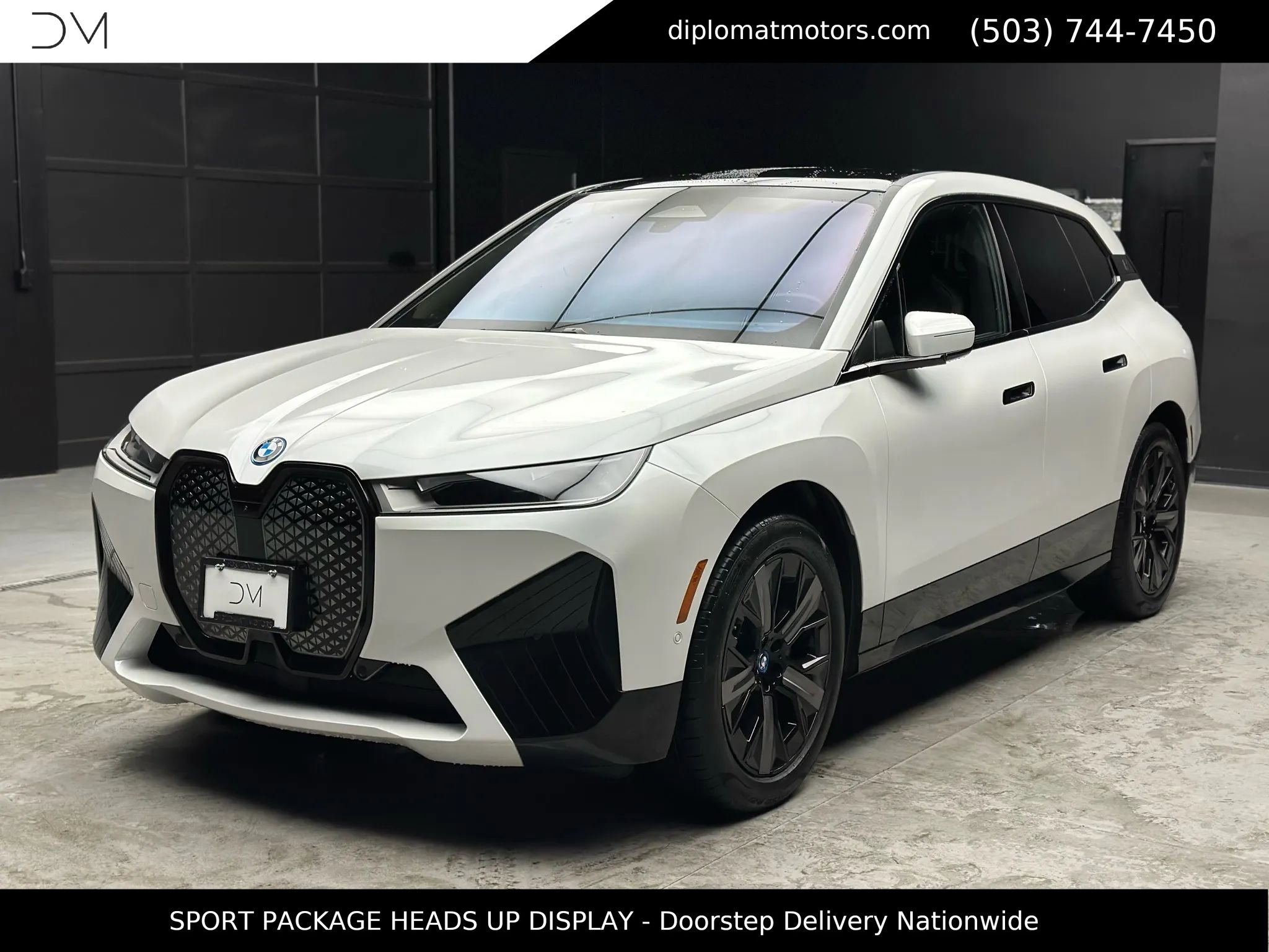 Used 2025 BMW iX xDrive50 w/ Sport Package image 1