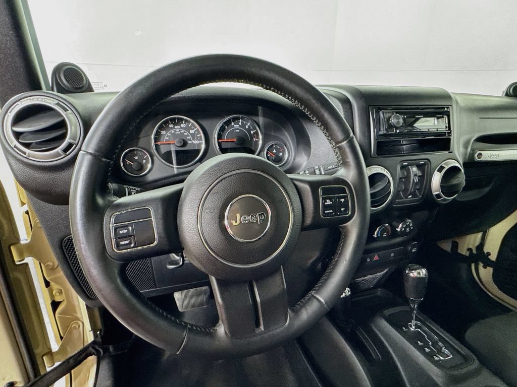 Used 2012 Jeep Wrangler Unlimited Sahara w/ Dual Top Group AWD/4WD image 11