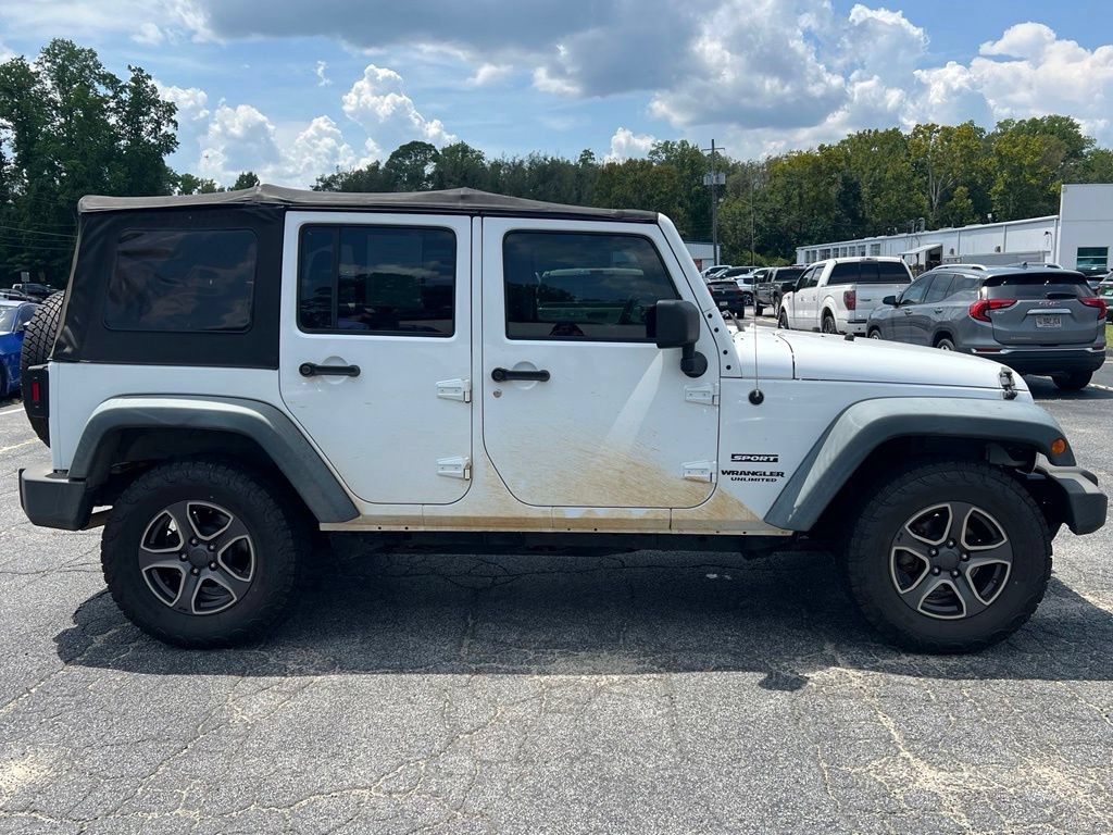 Used 2012 Jeep Wrangler Unlimited Sport AWD/4WD video 2