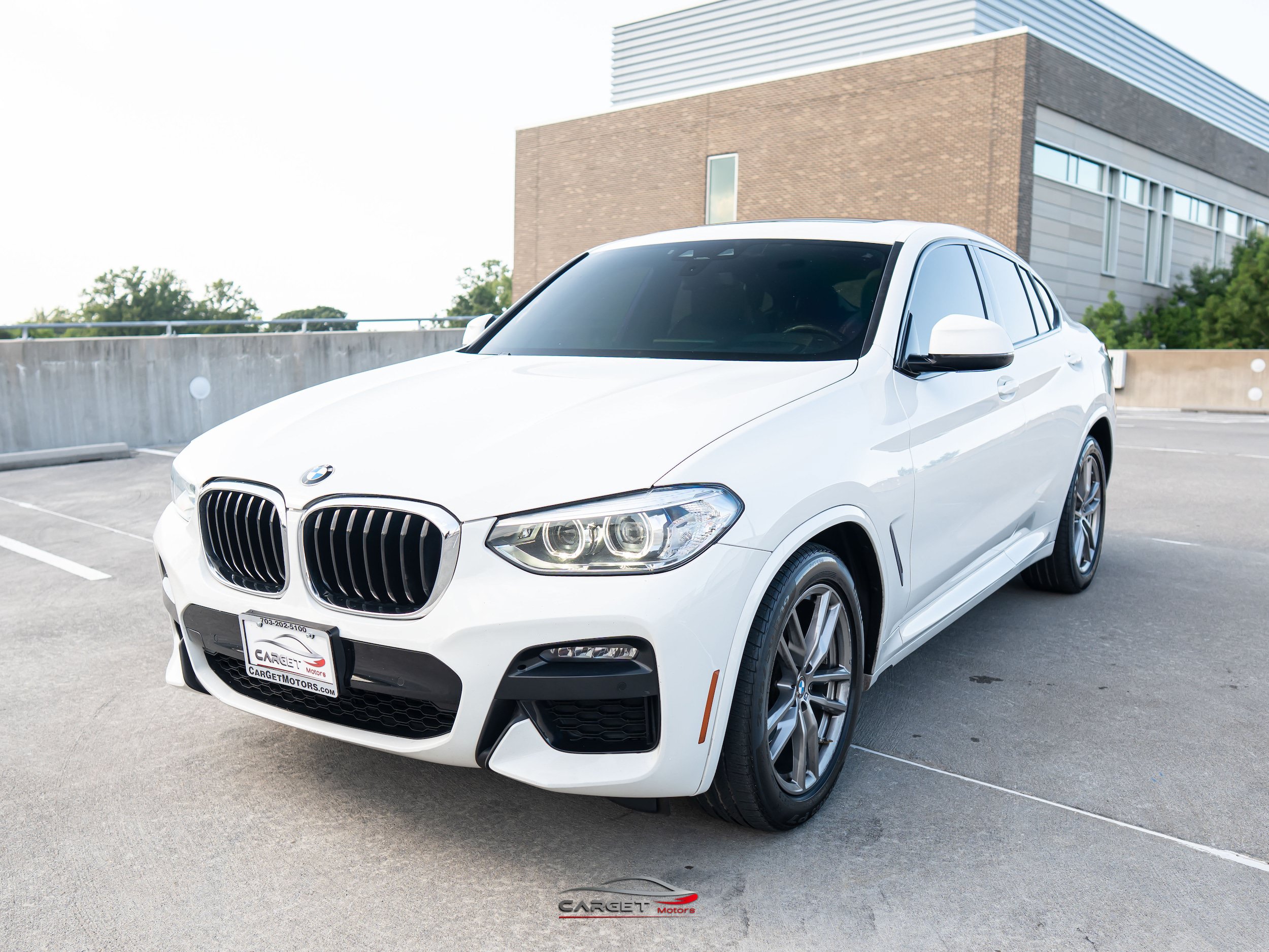 Used 2021 BMW X4 xDrive30i w/ M Sport Package AWD/4WD image 3
