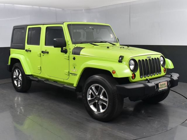 Used 2012 Jeep Wrangler Unlimited Sahara AWD/4WD image 1