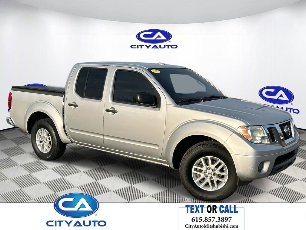 Used 2014 Nissan Frontier SV image 1