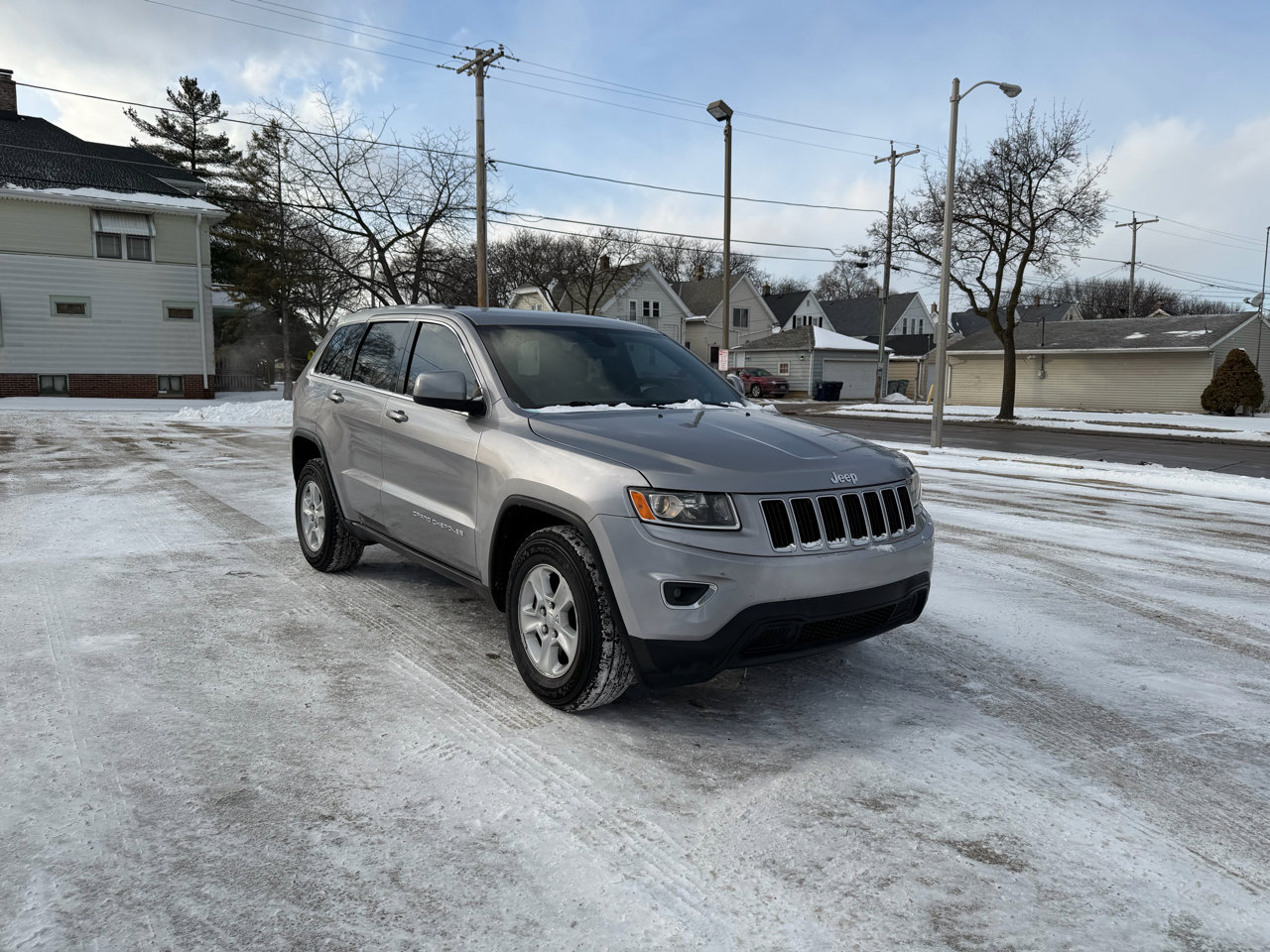 Used 2016 Jeep Grand Cherokee Laredo image 1