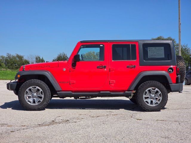 Used 2013 Jeep Wrangler Unlimited Rubicon w/ Dual Top Group AWD/4WD image 5