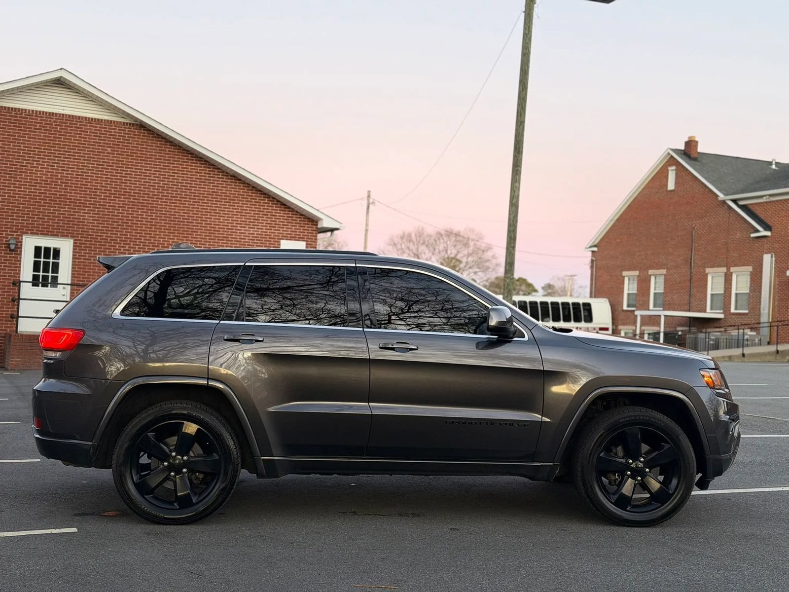 Used 2015 Jeep Grand Cherokee Altitude AWD/4WD image 7