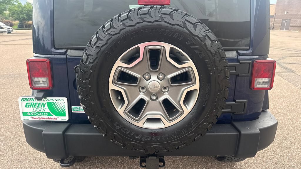 Used 2013 Jeep Wrangler Unlimited Rubicon w/ Dual Top Group AWD/4WD image 18