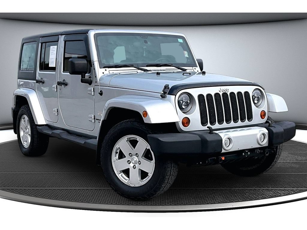 Used 2011 Jeep Wrangler Unlimited Sahara w/ Dual Top Group AWD/4WD image 2