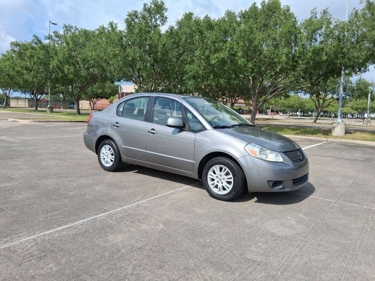 Used 2012 Suzuki SX4 LE image 2