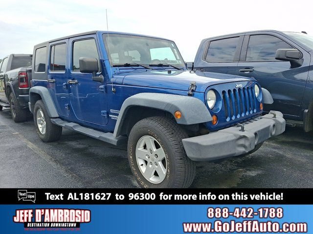 Used 2010 Jeep Wrangler Unlimited Sport AWD/4WD image 1