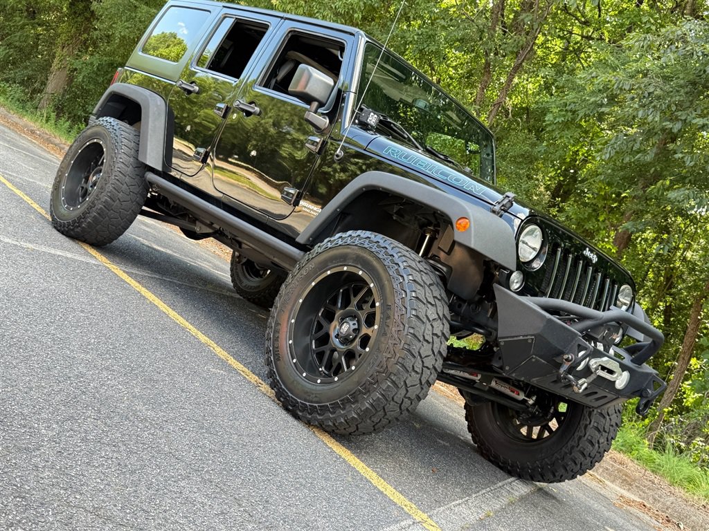 Used 2015 Jeep Wrangler Unlimited Rubicon w/ Dual Top Group AWD/4WD image 23