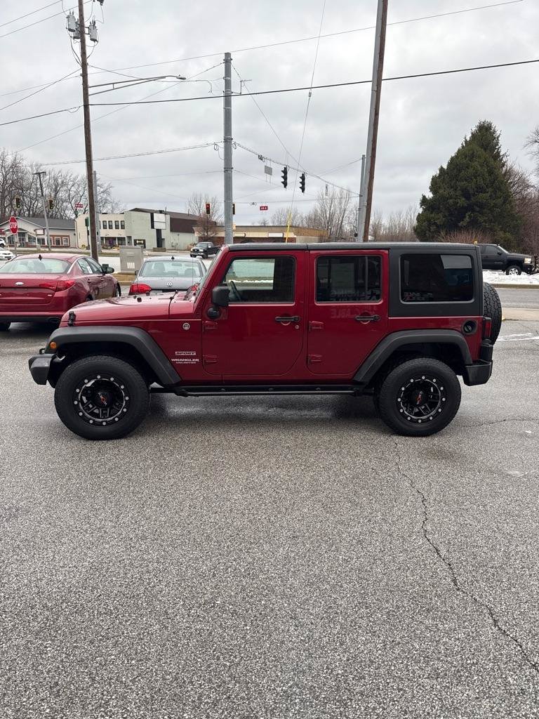 Used 2013 Jeep Wrangler Unlimited Sport AWD/4WD image 2