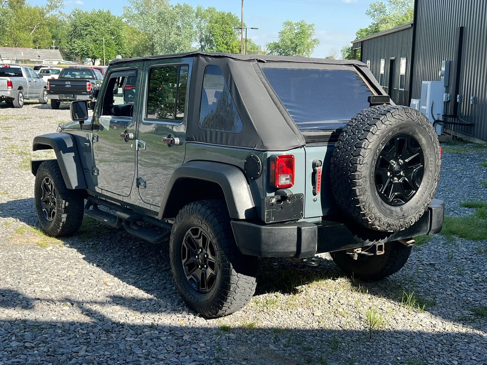 Used 2014 Jeep Wrangler Unlimited Sport w/ Dual Top Group AWD/4WD image 3