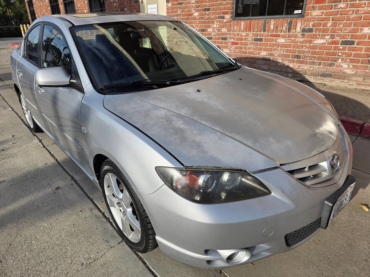 Used 2004 MAZDA MAZDA3 s w/ Moonroof & 6-CD Pkg FWD image 1