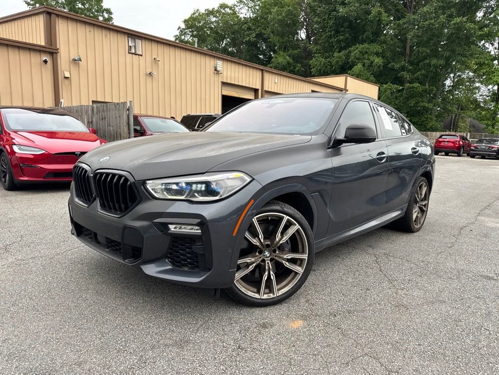 Used 2021 BMW X6 M50i w/ Executive Package AWD/4WD image 1
