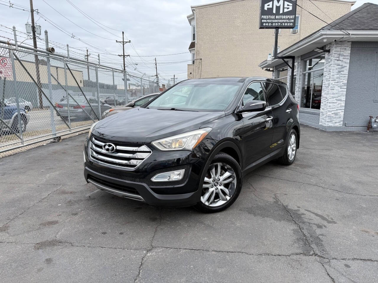 Used 2013 Hyundai Santa Fe Sport 2.0T w/ Technology Pkg image 1