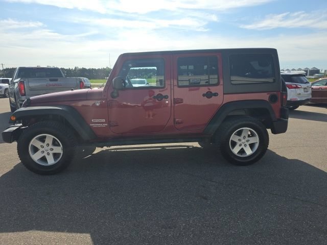 Used 2012 Jeep Wrangler Unlimited Sport AWD/4WD image 2