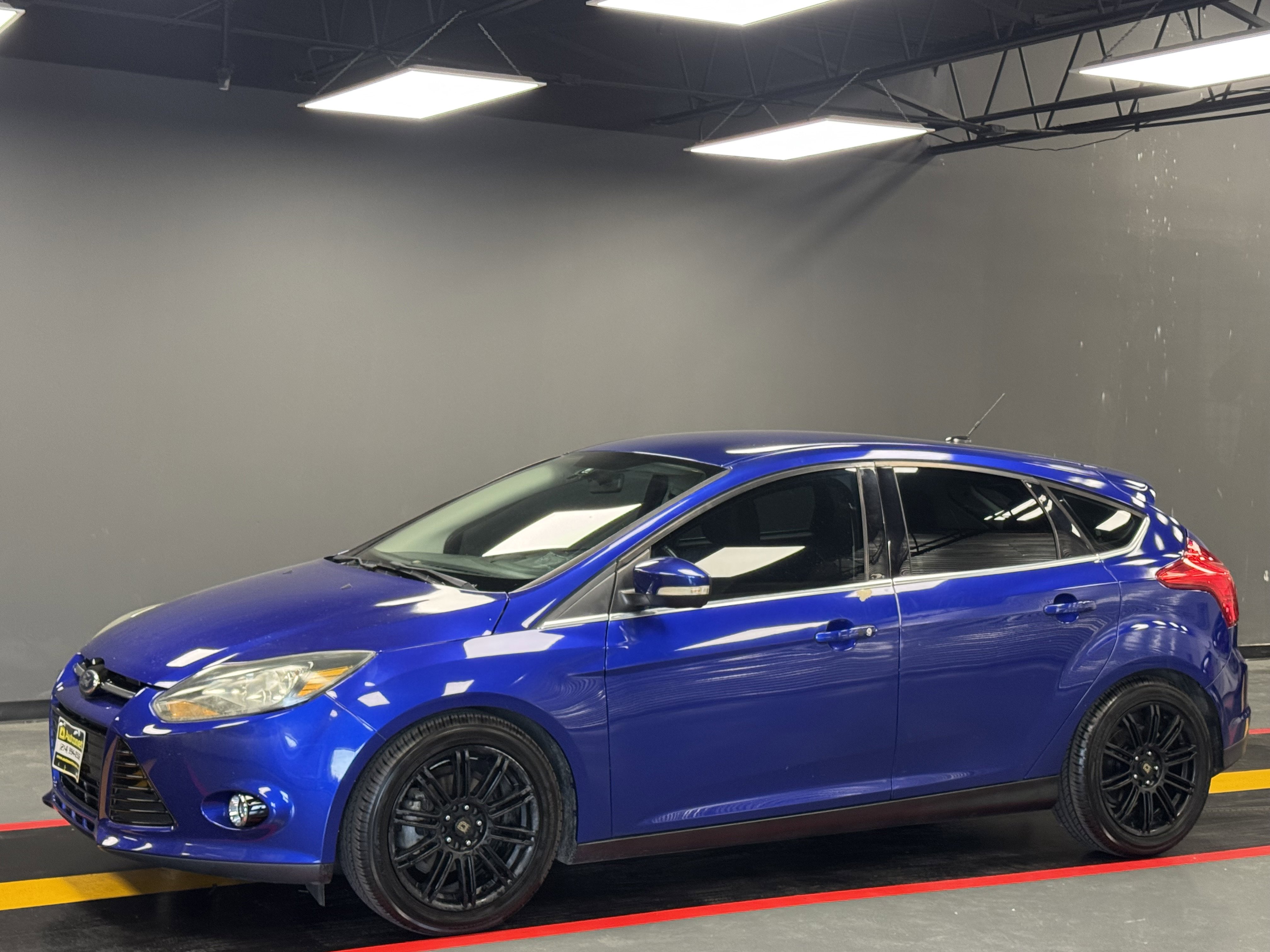 Used 2014 Ford Focus Titanium FWD image 1
