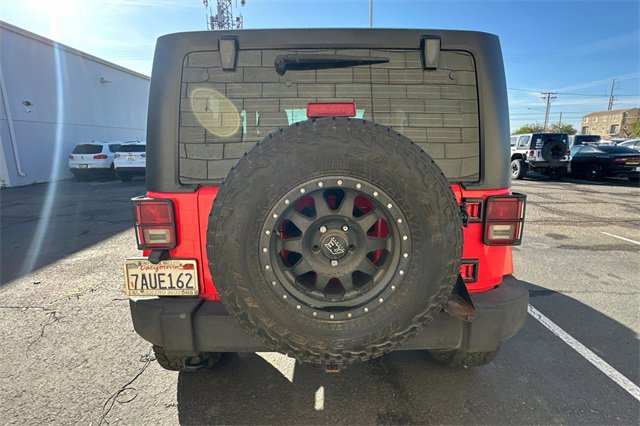 Used 2013 Jeep Wrangler Sport w/ Mopar Black Appearance Group image 3