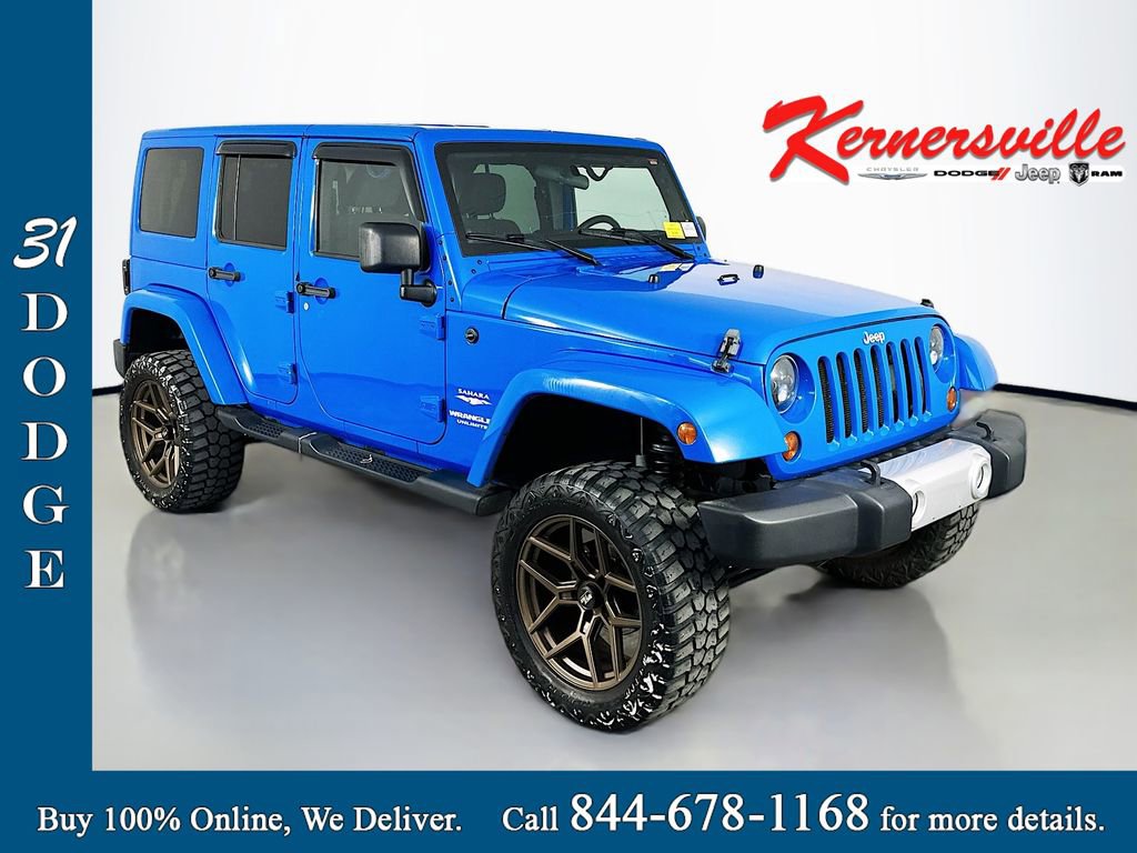 Used 2011 Jeep Wrangler Unlimited Sahara w/ Dual Top Group