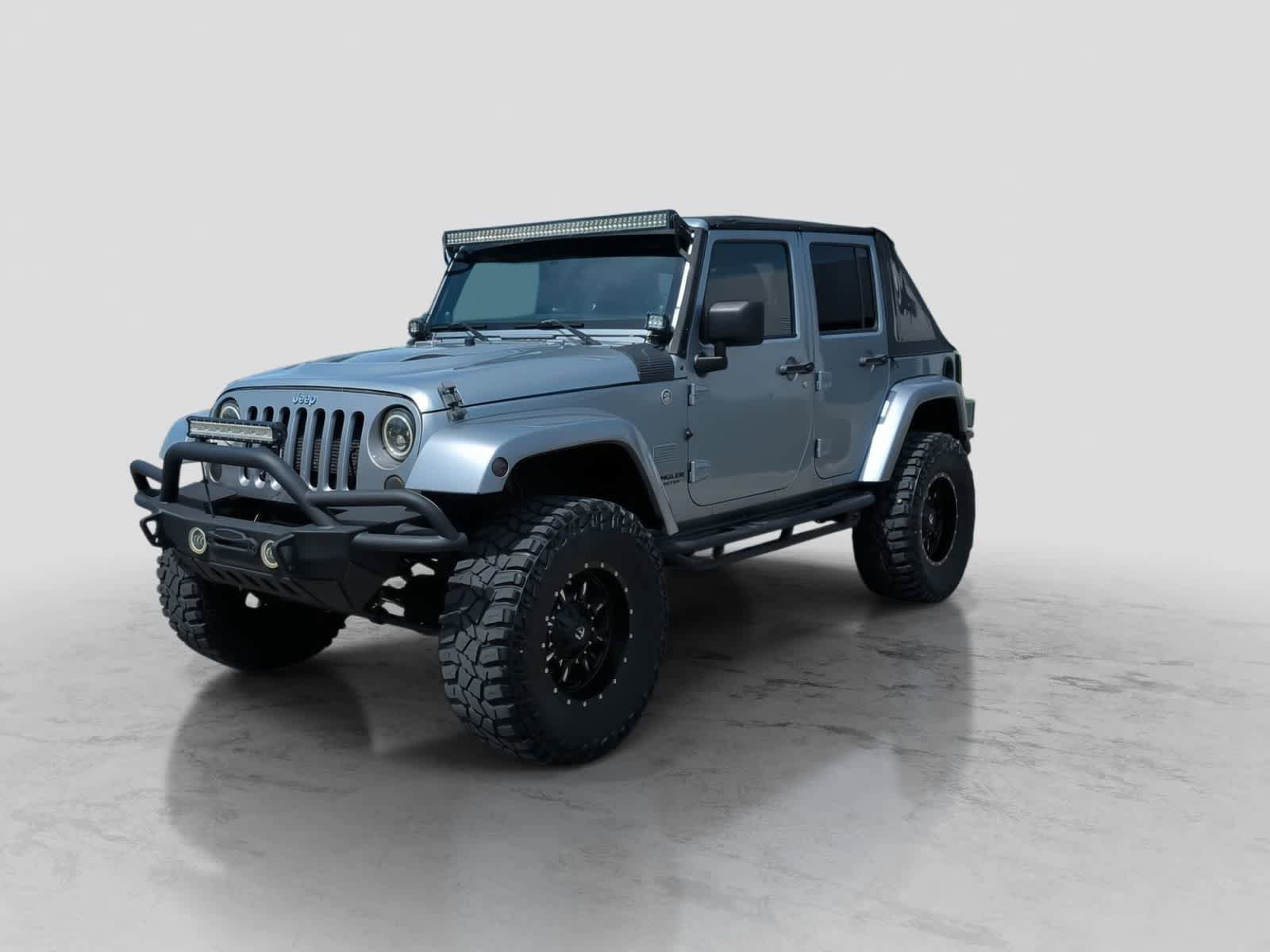 Used 2014 Jeep Wrangler Unlimited Sahara w/ Dual Top Group AWD/4WD image 4