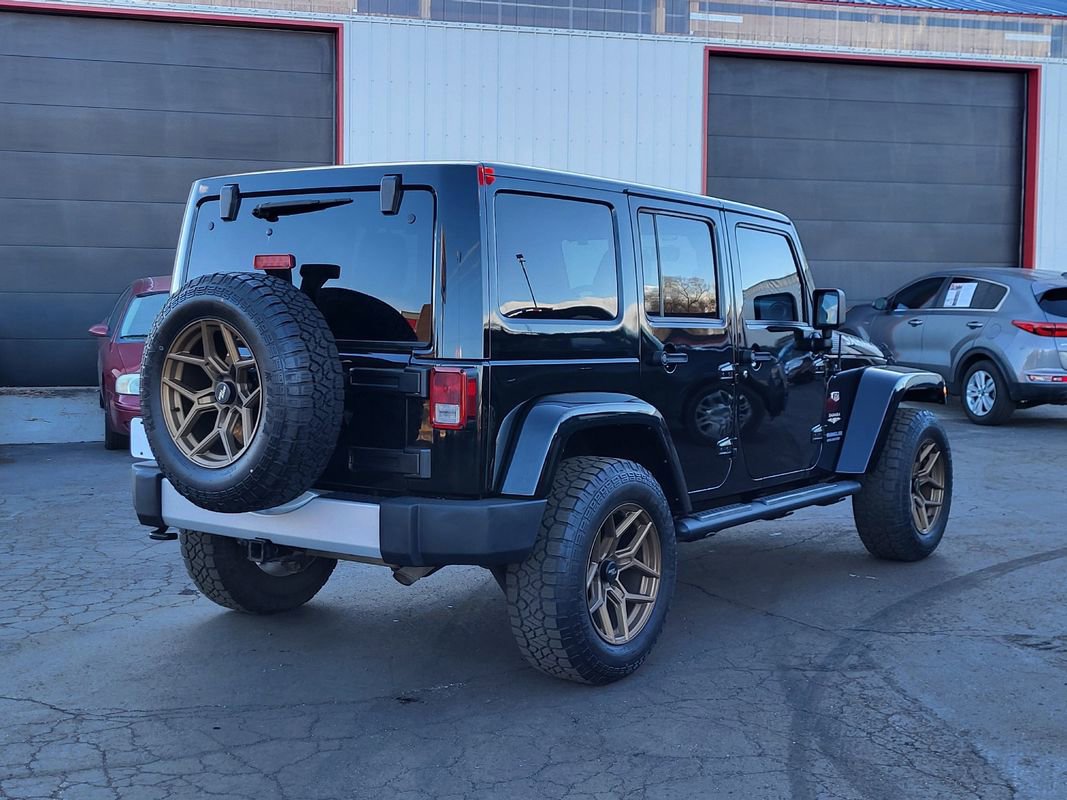 Used 2012 Jeep Wrangler Unlimited Sahara w/ Dual Top Group image 9