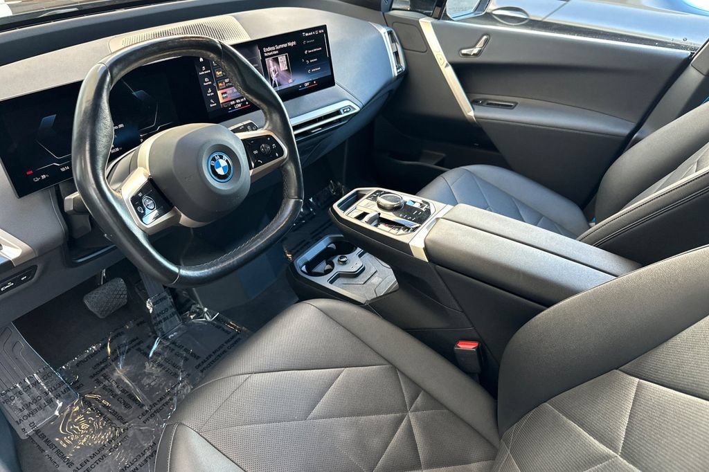 Used 2023 BMW iX xDrive50 w/ BMW I Signature Blue Package AWD/4WD image 9