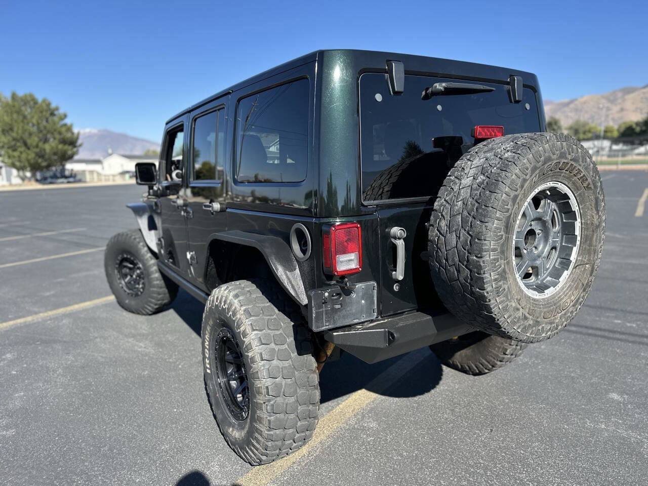 Used 2012 Jeep Wrangler Unlimited Rubicon w/ Dual Top Group image 11