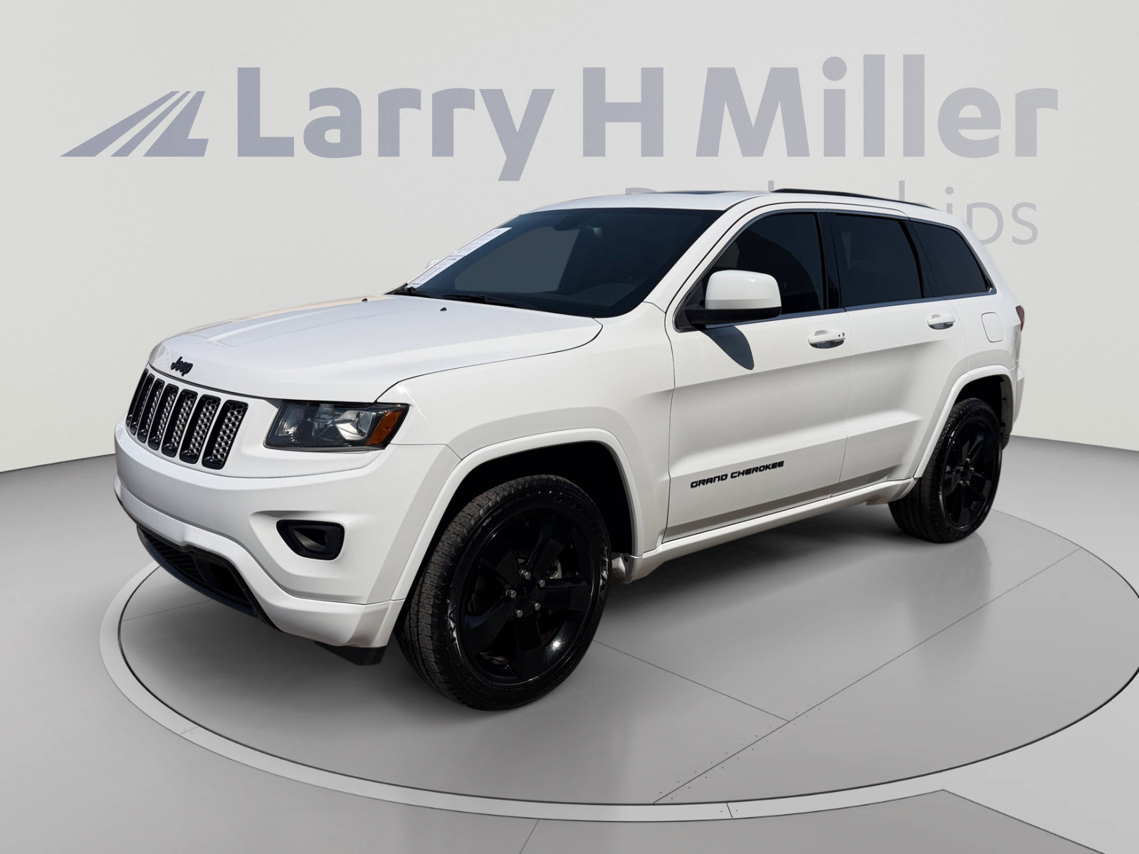 Used 2015 Jeep Grand Cherokee Altitude RWD image 1
