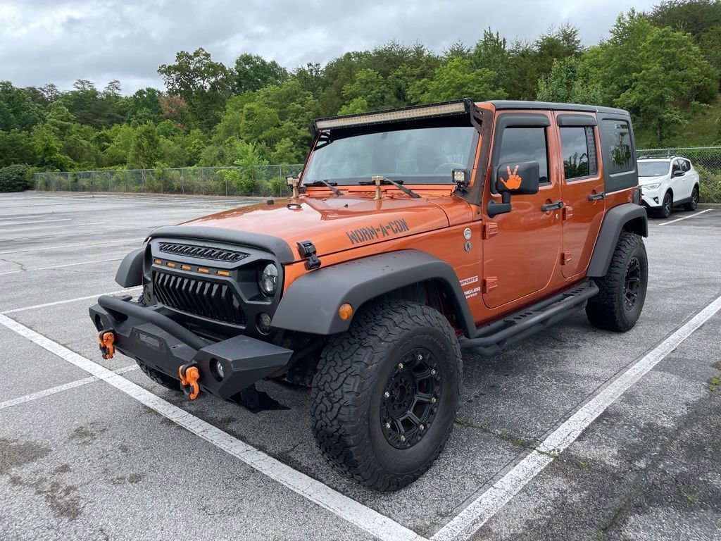 Used 2011 Jeep Wrangler Unlimited Sport w/ Trailer Tow Group AWD/4WD image 1
