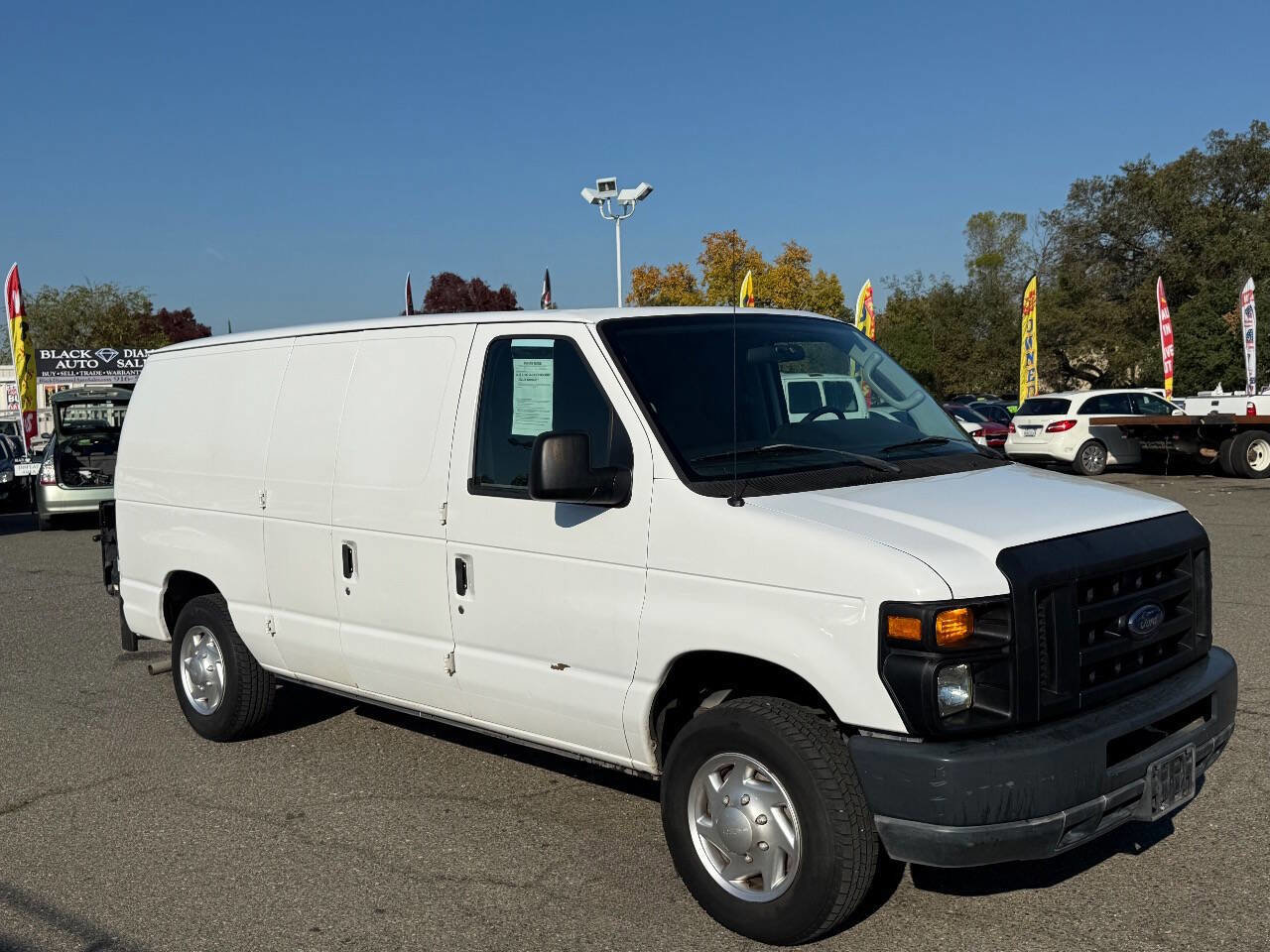 Used 2011 Ford E-150 and Econoline 150 w/ Commercial Cargo Van Pkg image 1