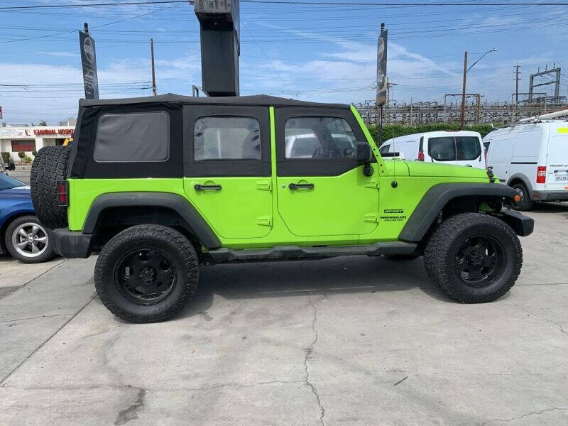 Used 2013 Jeep Wrangler Unlimited Sport w/ Mopar Black Appearance Group image 7