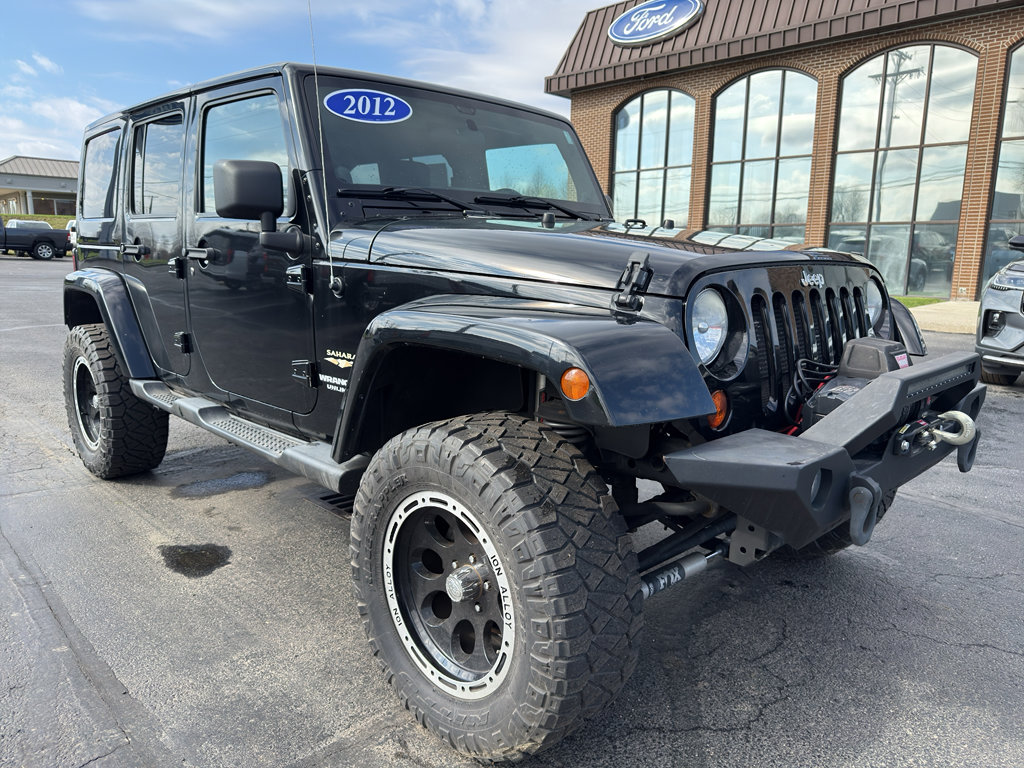 Used 2012 Jeep Wrangler Unlimited Sahara w/ Dual Top Group AWD/4WD image 3